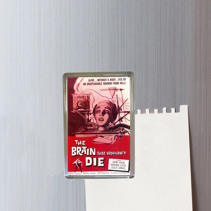 Fridge magnet with 'The Brain That Wouldn't Die' movie poster design on a metallic surface.