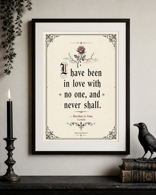 Framed quote print with decorative elements on a wall with a candle and bird figurine.