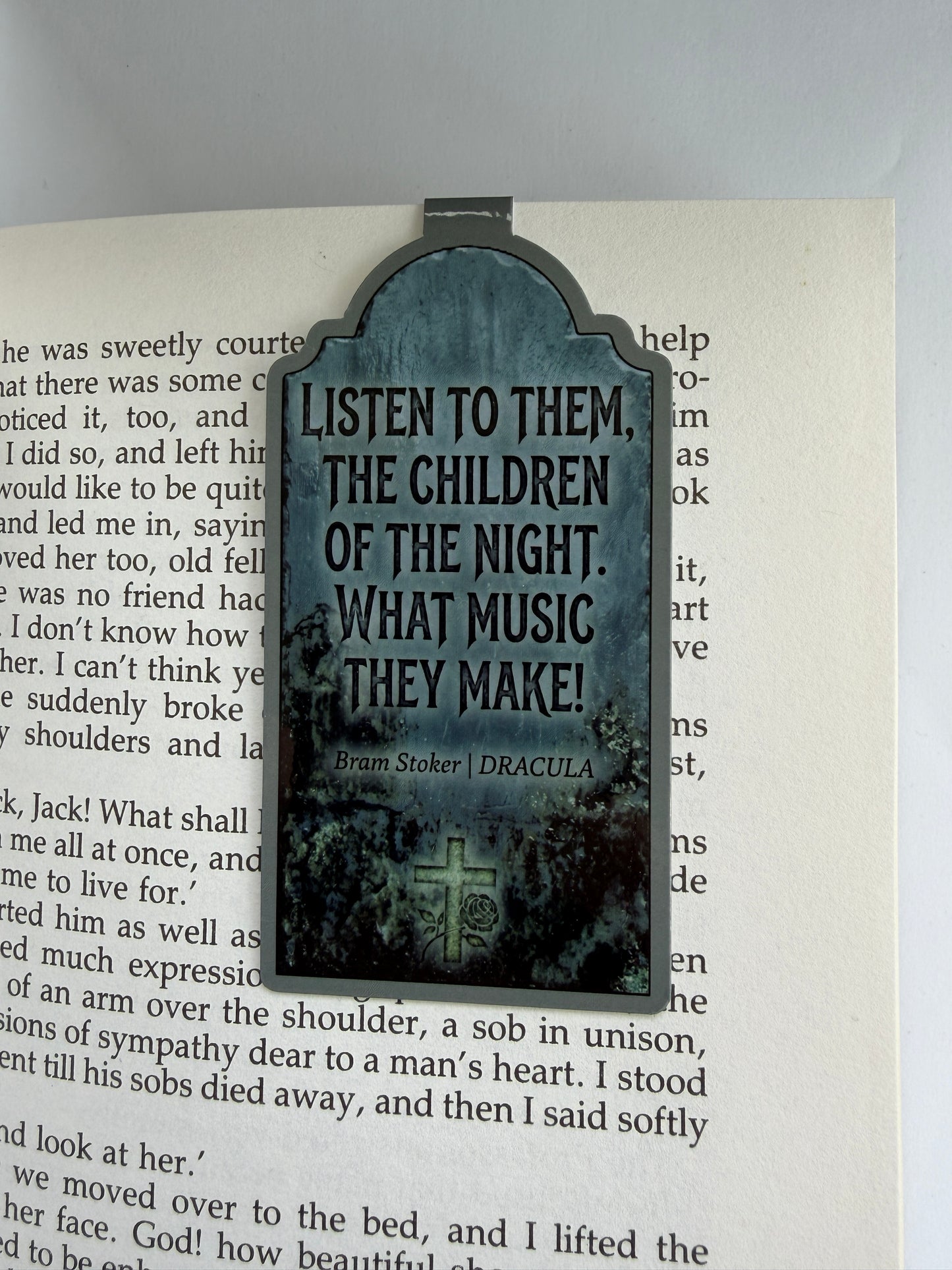 Decorative bookmark with text on a book page