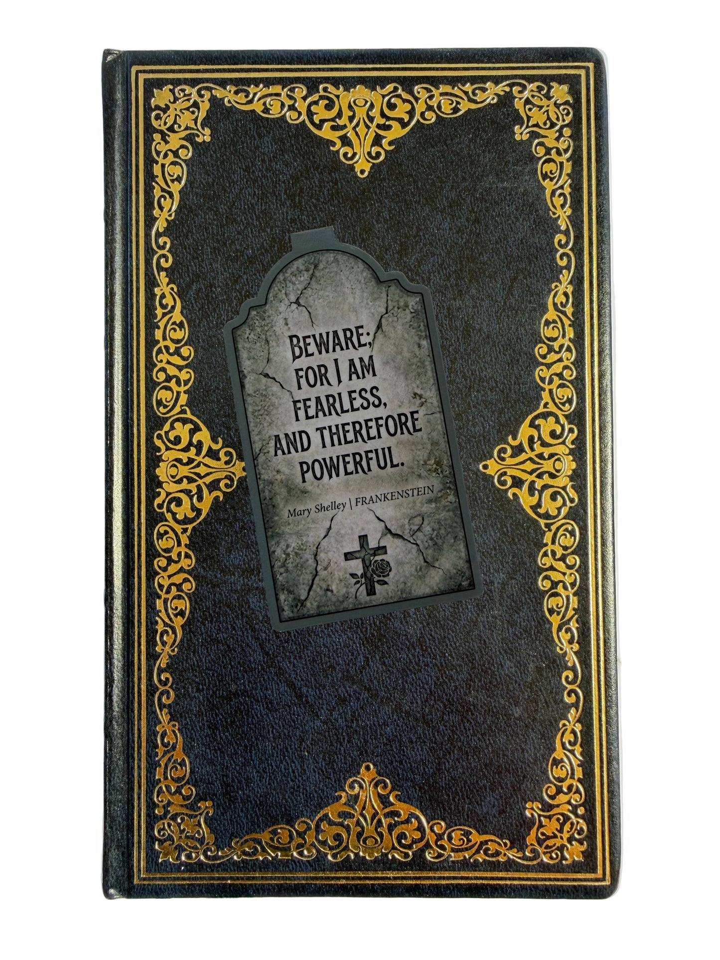 Decorative book cover with ornate gold design and a quote from 'Frankenstein'.