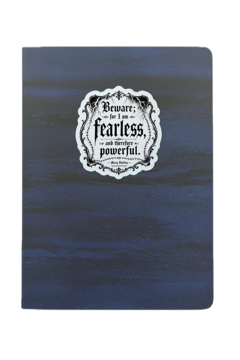 Notebook with a decorative label on a blue background