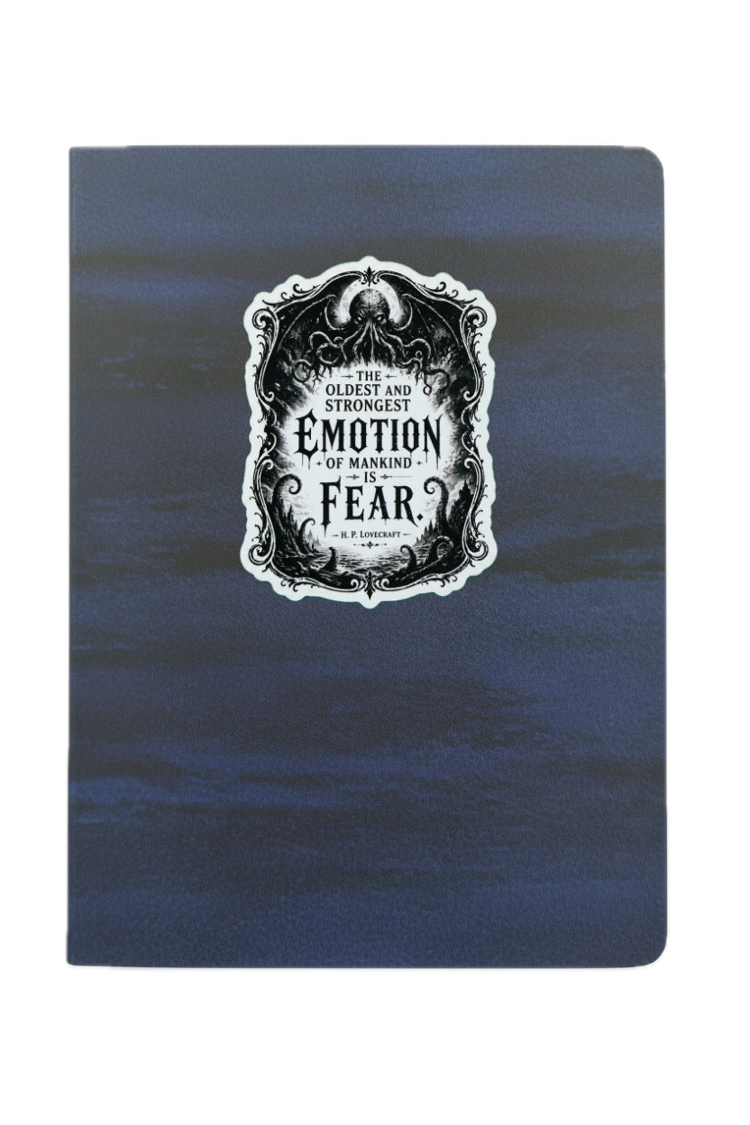 Blue notebook with a black and white label on a white background