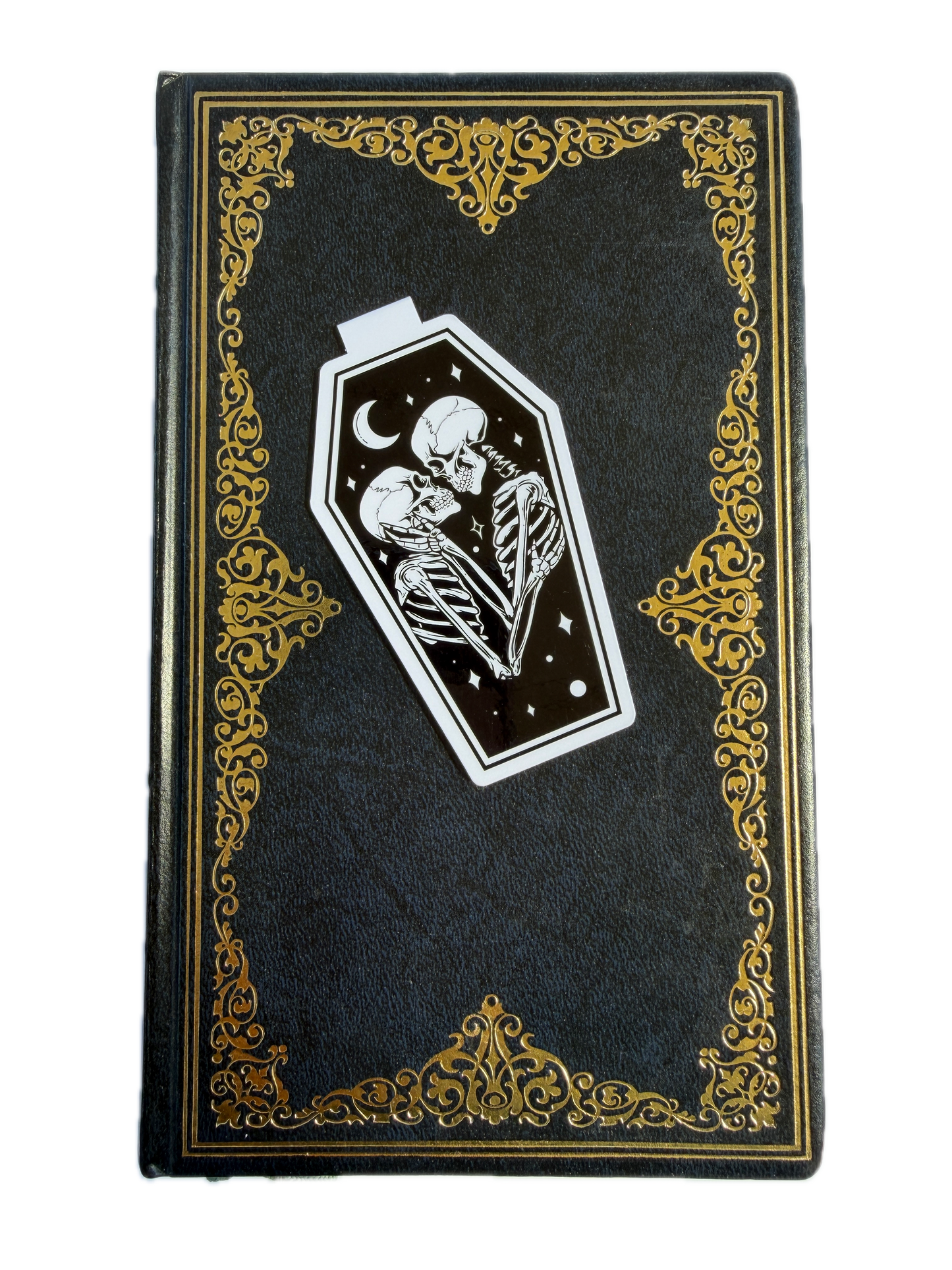 Decorative black box with gold accents and a white emblem featuring a skull and crescent moon.