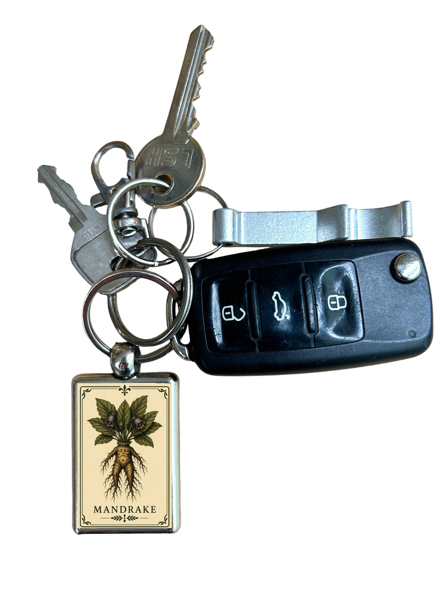 Keychain with mandrake plant charm and car key fob on a white background