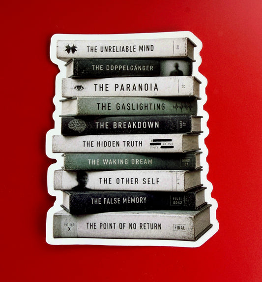 Stack of books with titles on a red background