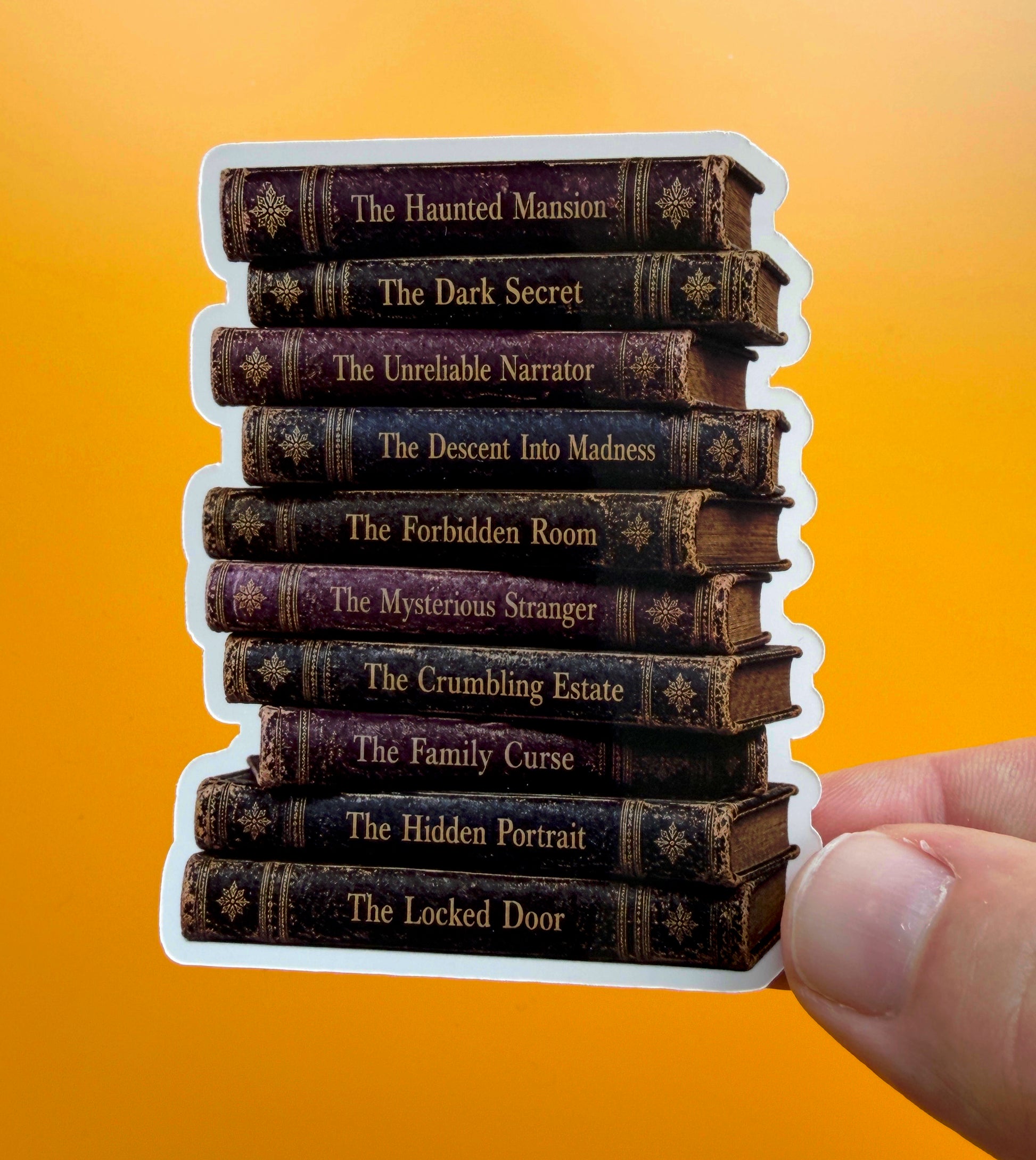 Stack of books with titles on a yellow background