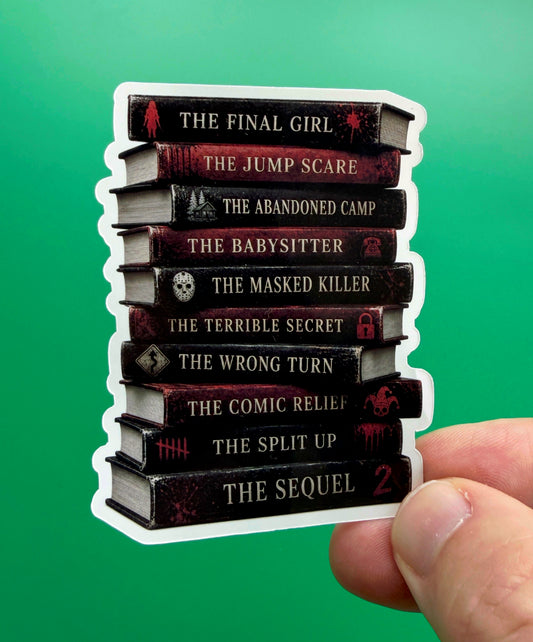 Stack of books with titles on a green background