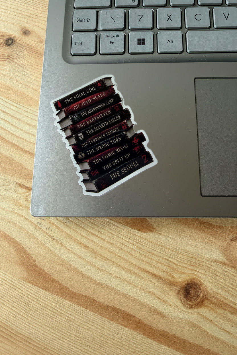 Stack of books sticker on a laptop keyboard